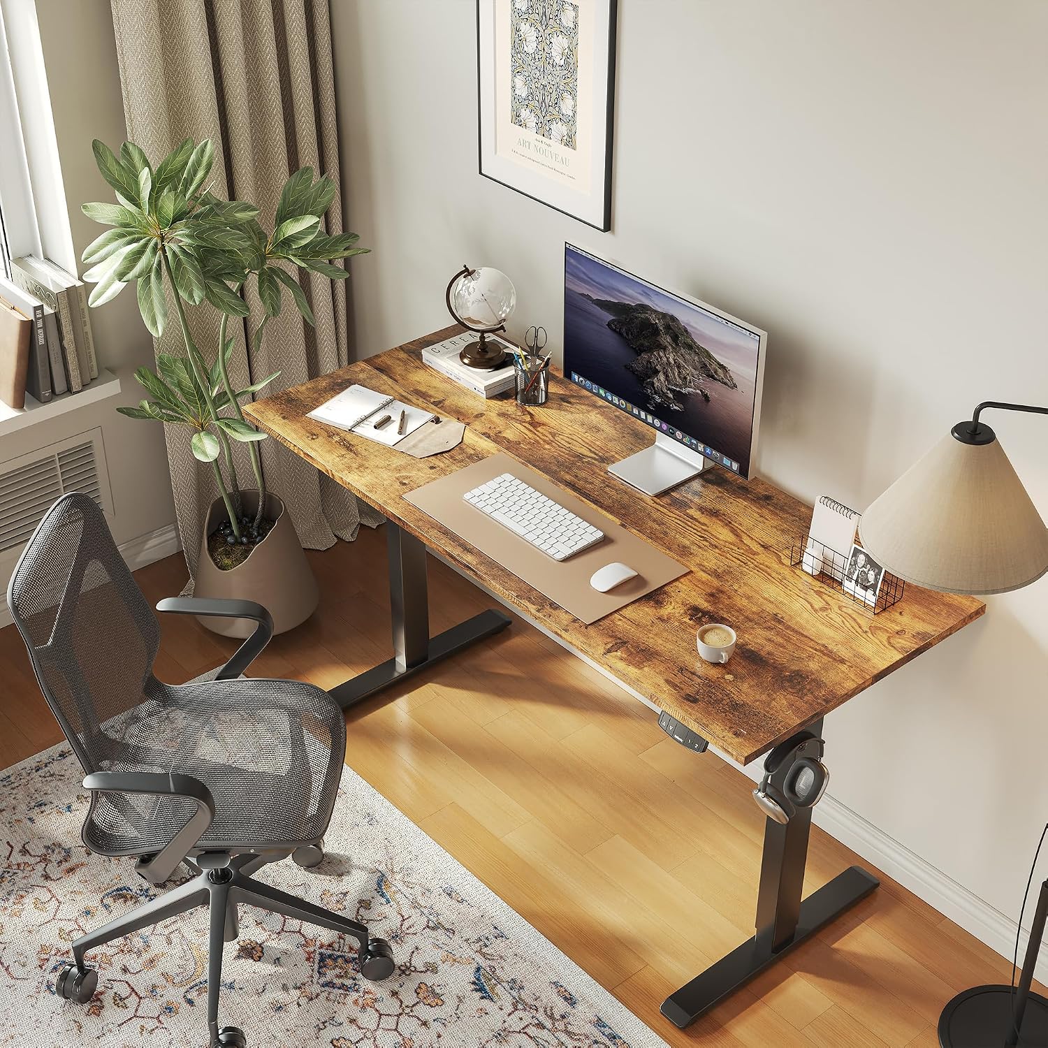 An Agilestic electric height-adjustable standing desk in a home office